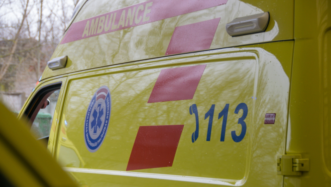 NMPD operatīvā auto sāns, ar NMPD logo un 113 uzrakstu